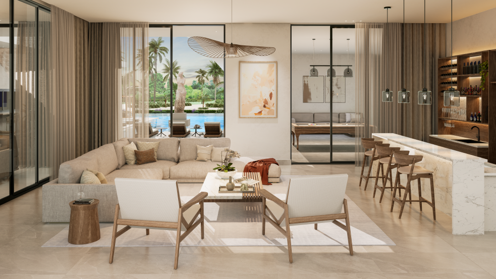 Sala con bar y vista al jardín y piscina
